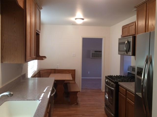 4814 E Avalon DR Kitchen 1 - New Flooring - 4814 E Avalon - 12-8-16_12082016